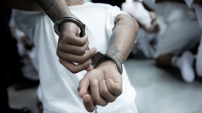 A Venezuelan deportee handcuffed at the Terrorism Confinement Center (CECOT). “A single judge in a single city cannot direct the movements of an aircraft carrier full of foreign alien terrorists who were physically expelled from US soil,” The White House said. (REUTERS)