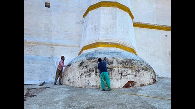 Workers whitewash the outer wall of the Shahi Jama Masjid, in Sambhal district on Monday. (PTI) Workers whitewash the outer wall of the Shahi Jama Masjid, in Sambhal district on Monday. (PTI)