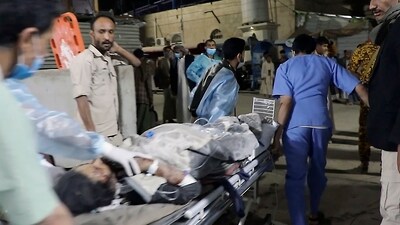 This photo taken from a video released by Ansar Allah Media Office via Al Masirah TV channel shows a being taken for treatment at a hospital in Saada, Yemen, on Saturday, March 15, 2025, following airstrikes over multiple targets in the country. (AP) This photo taken from a video released by Ansar Allah Media Office via Al Masirah TV channel shows a being taken for treatment at a hospital in Saada, Yemen, on Saturday, March 15, 2025, following airstrikes over multiple targets in the country. (AP)