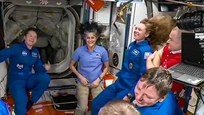 In this screenshot from a NASA video shows Suni Williams and other astronauts greeting each other after the SpaceX capsule docked with the International Space Station, Sunday, March 16 (NASA) In this screenshot from a NASA video shows Suni Williams and other astronauts greeting each other after the SpaceX capsule docked with the International Space Station, Sunday, March 16 (NASA)