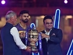 Roger Binny (L), president of the Board of Control for Cricket in India (BCCI) along with Jay Shah (R), secretary of the BCCI, presents the IPL trophy to Kolkata Knight Riders' captain Shreyas Iyer Roger Binny (L), president of the Board of Control for Cricket in India (BCCI) along with Jay Shah (R), secretary of the BCCI, presents the IPL trophy to Kolkata Knight Riders' captain Shreyas Iyer