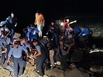 Rescue teams working on the site of a plane crash in Roatan, Honduras on March 17, 2025.