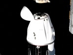 A SpaceX Crew Dragon capsule carrying Butch Wilmore and Sunita Williams undocks from the ISS to begin a journey to return to Earth on March 18, 2025, in this still image taken from video.