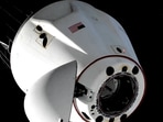 A SpaceX Crew Dragon capsule carrying Butch Wilmore and Sunita Williams, two veteran NASA astronauts who have been stuck on the International Space Station for nine months, and Roscosmos cosmonaut Aleksandr Gorbunov and NASA astronaut Nick Hague, manoeuvres in space following undocking from the ISS to begin a journey to return to Earth March 18, 2025 in this still image taken from video.(via REUTERS)