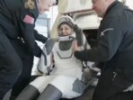 NASA astronaut Sunita Williams being taken out of SpaceX Dragon capsule.
