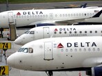 FILE PHOTO: Delta Airlines passenger jets are pictured outside the newly completed 1.3 million-square-foot $4 billion Delta Airlines Terminal C at LaGuardia Airport in the Queens borough of New York City,