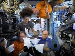 NASA astronauts Sunita Williams, Nick Hague, Barry Wilmore, and Donald Pettit unbox Thanksgiving meals, from the International Space Station (ISS), in this screen grab taken from a handout video, released on November 26, 2024.