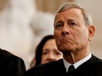 US Supreme Court Chief Justice John Roberts attends inauguration ceremonies in the Rotunda of the US Capitol.