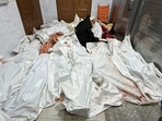 Dead bodies lie at Nasser hospital following Israeli strikes, in Khan Younis in the southern Gaza Strip, March 18.