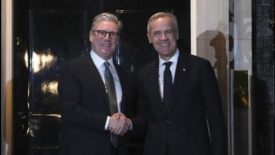 Canada Prime Minister Mark Carney (right) is greeted by British Prime Minister Keir Starmer in London on Monday. (AP) Canada Prime Minister Mark Carney (right) is greeted by British Prime Minister Keir Starmer in London on Monday. (AP)