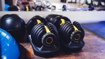 Adjustable dumbbells can keep you motivated to stay fit. (Adobe Stock) Adjustable dumbbells can keep you motivated to stay fit. (Adobe Stock)
