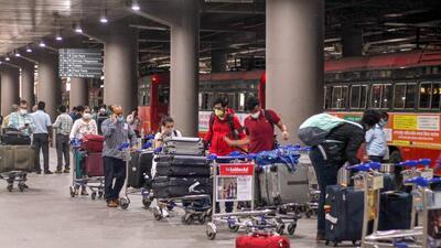 Mumbai: Indian nationals who were stranded in Singapore arrive by Air India flight at Mumbai International Airport after being evacuated by the government under 'Vande Bharat' mission, during the ongoing COVID-19 lockdown, in Mumbai, Sunday, May 10, 2020. (PTI Photo)(PTI10-05-2020_000260B) (PTI) Mumbai: Indian nationals who were stranded in Singapore arrive by Air India flight at Mumbai International Airport after being evacuated by the government under 'Vande Bharat' mission, during the ongoing COVID-19 lockdown, in Mumbai, Sunday, May 10, 2020. (PTI Photo)(PTI10-05-2020_000260B) (PTI)