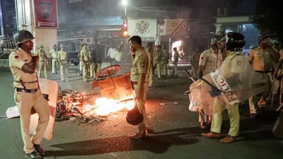 Police personnel deployed at the site after a clash broke out between two groups at the Mahal area, in Nagpur on Monday. (ANI) Police personnel deployed at the site after a clash broke out between two groups at the Mahal area, in Nagpur on Monday. (ANI)