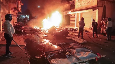 Fire dousing operations underway after a clash broke out between two groups at Mahal area, in Nagpur on Monday. (ANI) Fire dousing operations underway after a clash broke out between two groups at Mahal area, in Nagpur on Monday. (ANI)