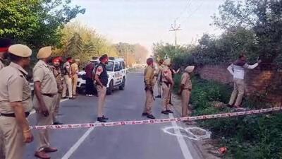 The Punjab Police team at the encounter site in Jalandhar on Tuesday. Accused Hardik Kamboj opened fire on the police when brought for weapon recovery to Jalandhar. (HT Photo) The Punjab Police team at the encounter site in Jalandhar on Tuesday. Accused Hardik Kamboj opened fire on the police when brought for weapon recovery to Jalandhar. (HT Photo)