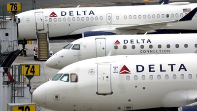 FILE PHOTO: Delta Airlines passenger jets are pictured outside the newly completed 1.3 million-square-foot $4 billion Delta Airlines Terminal C at LaGuardia Airport in the Queens borough of New York City, (REUTERS)