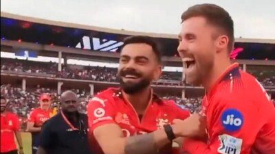 Virat Kohli and Phil Salt shared a laugh during the RCB event. (Screengrab - X/@RCBTweets) Virat Kohli and Phil Salt shared a laugh during the RCB event. (Screengrab - X/@RCBTweets)