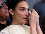 Gal Gadot gets emotional during her Walk of Fame ceremony; Pro-Palestine and Pro-Israel protestors outside the venue. Gal Gadot gets emotional during her Walk of Fame ceremony; Pro-Palestine and Pro-Israel protestors outside the venue.