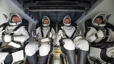 After landing in the water, Butch Wilmore, Alexander Gorbunov, Nick Hague and Sunita Williams sat in the SpaceX recovery ship Megan (NASA via AP)