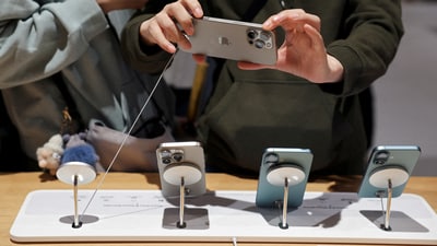 iPhone 18 Pro could get the C2 exclusively. (Florence Lo/Reuters)