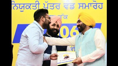 Chief minister Bhagwant Mann hands over appointment letters to teachers at Guru Nanak Dev Bhawan in Ludhiana on Wednesday. (HT photo) Chief minister Bhagwant Mann hands over appointment letters to teachers at Guru Nanak Dev Bhawan in Ludhiana on Wednesday. (HT photo)