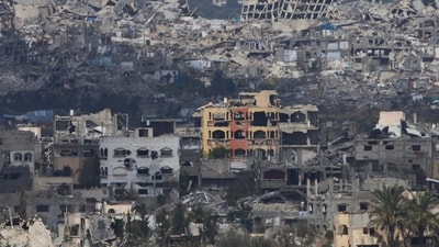 A view of destroyed buildings by Israeli bombardments in the northern Gaza Strip as seen from southern Israel. (AP) A view of destroyed buildings by Israeli bombardments in the northern Gaza Strip as seen from southern Israel. (AP)