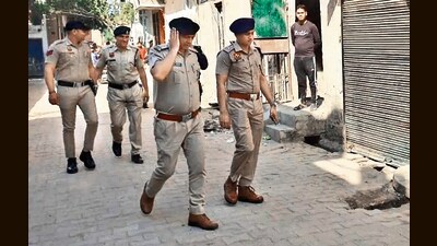 Police inspecting the spot where the incident took place in Karnal on Wednesday. (HT Photo)