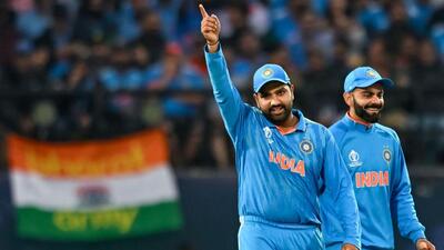 Rohit Sharma (L) and Virat Kohli gesture during an ODI. (AFP)
