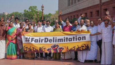 DMK MPs stage a protest over the issue of delimitation of parliamentary constituencies during the Budget session of Parliament, in New Delhi, Wednesday, March 19, 2025. (PTI) DMK MPs stage a protest over the issue of delimitation of parliamentary constituencies during the Budget session of Parliament, in New Delhi, Wednesday, March 19, 2025. (PTI)