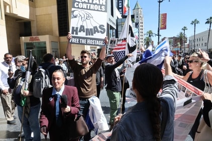 HOLLYWOOD, CALIFORNIA - MARCH 18: Pro-Palestine and pro-Israel protesters disrupt Gal Gadot's Hollywood Walk of Fame star ceremony In Hollywood on March 18, 2025 in Hollywood, California. Frazer Harrison/Getty Images/AFP (Photo by Frazer Harrison / GETTY IMAGES NORTH AMERICA / Getty Images via AFP) (Getty Images via AFP) HOLLYWOOD, CALIFORNIA - MARCH 18: Pro-Palestine and pro-Israel protesters disrupt Gal Gadot's Hollywood Walk of Fame star ceremony In Hollywood on March 18, 2025 in Hollywood, California. Frazer Harrison/Getty Images/AFP (Photo by Frazer Harrison / GETTY IMAGES NORTH AMERICA / Getty Images via AFP) (Getty Images via AFP)