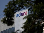 The logo of the Adani Group is seen on the facade of its Corporate House on the outskirts of Ahmedabad, India, November 21, 2024.