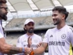 Virat Kohli presented Nitish Kumar Reddy his debut Test cap in Perth. Virat Kohli presented Nitish Kumar Reddy his debut Test cap in Perth.