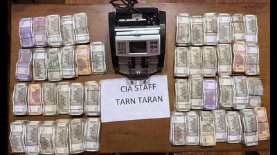 As much as  ₹10 lakh was also seized from the house of already arrested accused Satnam Singh, alias Sagar, a resident of Basarke Gillan village in Amritsar district (HT Photo)