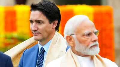 Canada's Prime Minister Justin Trudeau, left, walks past India's Prime Minister Narendra Modi as they take part in a wreath-laying ceremony at Raj Ghat, Mahatma Gandhi's cremation site, during the G20 Summit in New Delhi. (AP) Canada's Prime Minister Justin Trudeau, left, walks past India's Prime Minister Narendra Modi as they take part in a wreath-laying ceremony at Raj Ghat, Mahatma Gandhi's cremation site, during the G20 Summit in New Delhi. (AP)