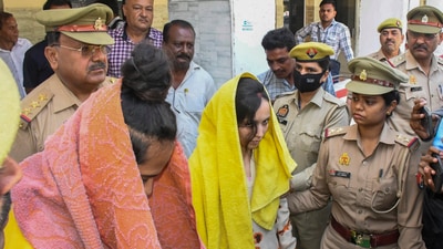 Meerut: Police take away merchant navy officer Saurabh Rajput's wife Muskan and her lover Sahil Shukla after they were arrested in connection with his murder. (PTI) Meerut: Police take away merchant navy officer Saurabh Rajput's wife Muskan and her lover Sahil Shukla after they were arrested in connection with his murder. (PTI)