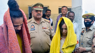 Police take away merchant navy officer Saurabh Rajput's wife Muskaan and her lover Sahil Shukla after they were arrested in connection with his murder, in Meerut, on Wednesday, (PTI) Police take away merchant navy officer Saurabh Rajput's wife Muskaan and her lover Sahil Shukla after they were arrested in connection with his murder, in Meerut, on Wednesday, (PTI)