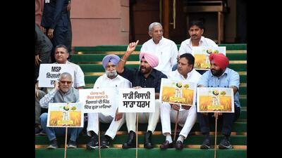 Punjab Congress president Amarinder Singh Raja Warring along with party MPs staged a protest against Punjab and the central government on the issue of removal of farmers from Punjab - Haryana Khanauri border and Shambhu border on the Parliament premises in New Delhi on Thursday. (ANI Photo/Rahul Singh) Punjab Congress president Amarinder Singh Raja Warring along with party MPs staged a protest against Punjab and the central government on the issue of removal of farmers from Punjab - Haryana Khanauri border and Shambhu border on the Parliament premises in New Delhi on Thursday. (ANI Photo/Rahul Singh)