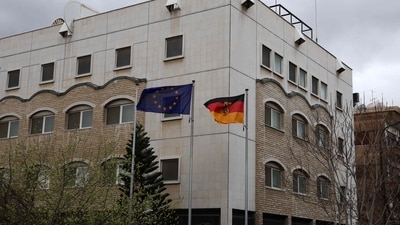 The German and European flags fly in front of the newly reopened German embassy in Damascus on March 20, 2025. Germany's Foreign Minister Annalena Baerbock officially reopened her country's embassy in war-ravaged Syria during a one-day visit to Damascus on March 20. (AFP) The German and European flags fly in front of the newly reopened German embassy in Damascus on March 20, 2025. Germany's Foreign Minister Annalena Baerbock officially reopened her country's embassy in war-ravaged Syria during a one-day visit to Damascus on March 20. (AFP)