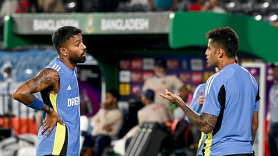 Suryakumar Yadav (R) will lead Mumbai Indians in their opening match against CSK (AFP) Suryakumar Yadav (R) will lead Mumbai Indians in their opening match against CSK (AFP)