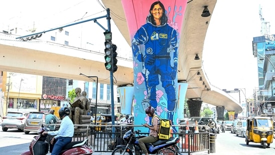 A mural of NASA astronaut Sunita "Suni" Williams at a traffic signal junction in Hyderabad. (AFP)