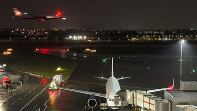 A plane is prepared whilst another airplane approaches landing at Heathrow Airport after a fire at an electrical substation shuttered Europe's busiest air travel hub in London, Friday, March 21, 2025. (AP) A plane is prepared whilst another airplane approaches landing at Heathrow Airport after a fire at an electrical substation shuttered Europe's busiest air travel hub in London, Friday, March 21, 2025. (AP)