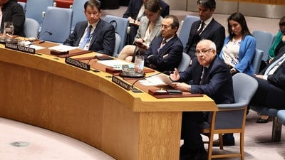 NEW YORK, NEW YORK - MARCH 20: Members of the United Nations Security Council listen as Riyad Mansour, Palestinian Ambassador to the UN, speaks during a meeting concerning the situation in the Middle East, including the Palestinian question at the United Nations headquarters on March 20, 2025 in New York City. Eli Sharabi, a former hostage released by the Hamas terror group in Gaza last month, shared his first hand account of his captivity as the Security Council met days after Israel broke it's ceasefire with Hamas by launching airstrikes that have killed more than 400 people and hundreds more injured. Michael M. Santiago/Getty Images/AFP (Photo by Michael M. Santiago / GETTY IMAGES NORTH AMERICA / Getty Images via AFP) (Getty Images via AFP) NEW YORK, NEW YORK - MARCH 20: Members of the United Nations Security Council listen as Riyad Mansour, Palestinian Ambassador to the UN, speaks during a meeting concerning the situation in the Middle East, including the Palestinian question at the United Nations headquarters on March 20, 2025 in New York City. Eli Sharabi, a former hostage released by the Hamas terror group in Gaza last month, shared his first hand account of his captivity as the Security Council met days after Israel broke it's ceasefire with Hamas by launching airstrikes that have killed more than 400 people and hundreds more injured. Michael M. Santiago/Getty Images/AFP (Photo by Michael M. Santiago / GETTY IMAGES NORTH AMERICA / Getty Images via AFP) (Getty Images via AFP)