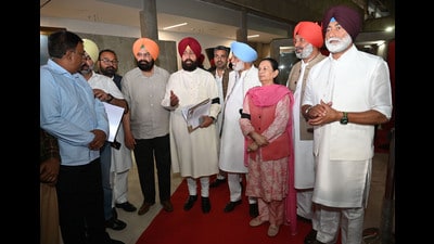 Leader of opposition Partap Singh Bajwa along with other congress MLAs staged a walkout during governor’s address at the first day of Punjab budget session on Friday. (Ravi Kumar/Hindustan Times)