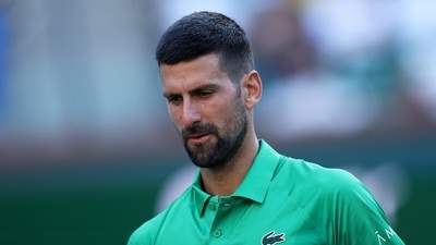 Novak Djokovic of Serbia shows his dejection against Botic van de Zandschulp of the Netherlands in their second round match during the BNP Paribas Open. (Getty Images via AFP) Novak Djokovic of Serbia shows his dejection against Botic van de Zandschulp of the Netherlands in their second round match during the BNP Paribas Open. (Getty Images via AFP)