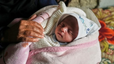 Ella Osama Abu Dagga, 25 days old, is held by her great-aunt Suad Abu Dagga, after she was pulled from the rubble earlier following an Israeli army airstrike that killed her parents and brother, in Khan Younis, southern Gaza Strip, Thursday, March 20, 2025. (AP) Ella Osama Abu Dagga, 25 days old, is held by her great-aunt Suad Abu Dagga, after she was pulled from the rubble earlier following an Israeli army airstrike that killed her parents and brother, in Khan Younis, southern Gaza Strip, Thursday, March 20, 2025. (AP)