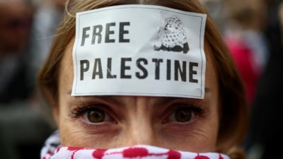A woman takes part in a protest to show support for Palestinians in Gaza, amid the ongoing conflict between Israel and Hamas, near the Pantheon in Rome, Italy, March 20, 2025. (Reuters) A woman takes part in a protest to show support for Palestinians in Gaza, amid the ongoing conflict between Israel and Hamas, near the Pantheon in Rome, Italy, March 20, 2025. (Reuters)