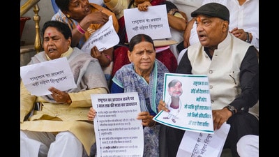 Senior RJD leader Rabri Devi with party legislators stage a 'dharna' during the Budget session of the state assembly, in Patna, on Friday. RJD members demanded resignation of CM Nitish Kumar over his alleged ‘insult to the National Anthem’ during a sporting event on Thursday. (PTI) Senior RJD leader Rabri Devi with party legislators stage a 'dharna' during the Budget session of the state assembly, in Patna, on Friday. RJD members demanded resignation of CM Nitish Kumar over his alleged ‘insult to the National Anthem’ during a sporting event on Thursday. (PTI)