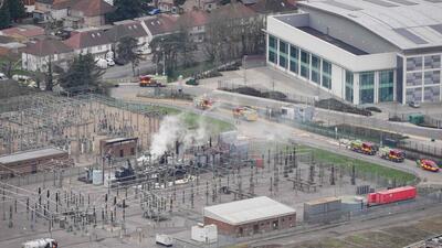 Smoke billows from a substation supplying power to Heathrow Airport in west London. (AFP Photo) Smoke billows from a substation supplying power to Heathrow Airport in west London. (AFP Photo)