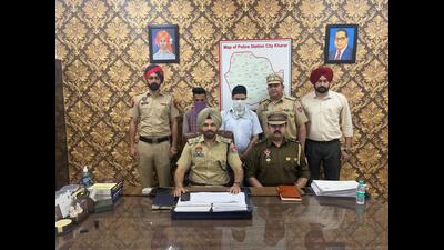 The accused in police custody in Mohali district on Friday. (HT Photo) The accused in police custody in Mohali district on Friday. (HT Photo)