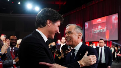 Mark Carney with Justin Trudeau (AP)